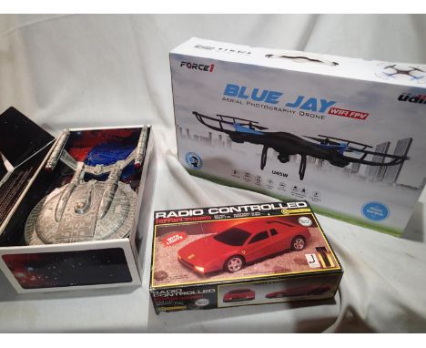 Force 1 Blue Jay aerial photography drone, as new and boxed, plus Starship Enterprise electronic model with sound and lights,