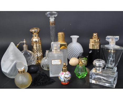 A collection of vintage 20th century Perfume bottles. The assortment to include Champs-Elysees Guerlain Paris, Chanel No.5 re