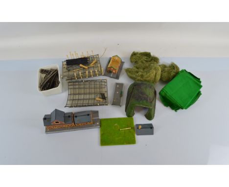 A quantity of assorted model railway layout accessories, including buildings and track