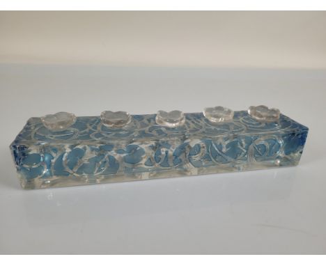 A Rene Lalique Les Fleurs d'Orsary stained blue and frosted clear glass Flacon Presentoir and stoppers, of rectangular shape 