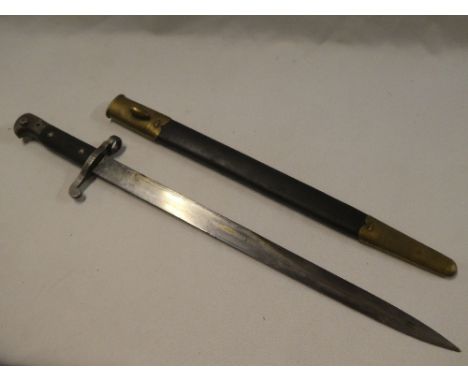 A 1887 pattern Enfield sword bayonet with 18" blade by Wilkinson of London, chequered leather grips in brass mounted leather 