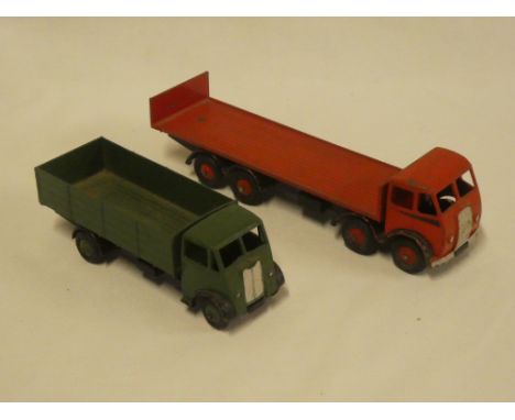 A Dinky Supertoys red flatbed Foden lorry and a Dinky Supertoys green/black Guy lorry (2)