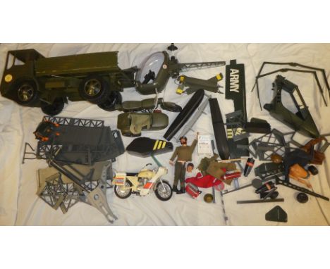 A selection of vintage Action Man items including Action Man figure, lorry, helicopter, aircraft, motorcycle and sidecar, pol
