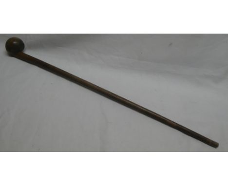 An African tribal hardwood club/stick with spherical end 32" long