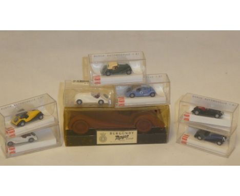 Seven Busch mint miniature Morgan sports car models in original boxes and one other