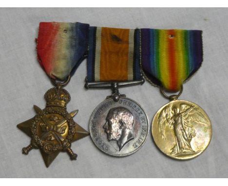 A 1914 star trio of medals awarded to No. 3-4951 Pte. R. J. Ellis 1/DCLI, discharged through wounds