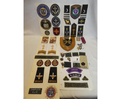 A selection of various Chaplain's badges of the World including US Navy Chaplain's Corps, United States Army Chaplain, New So