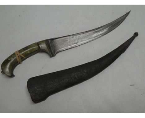 A 19th century Indo-Persian dagger with 8½" curved single edged blade and jade mounted hilt (af) in leather sheath
