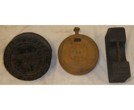 A Great Western Railway boundary marker dated 1889, British Rail Western Region 20lb signal counter balance weight and a GWR 