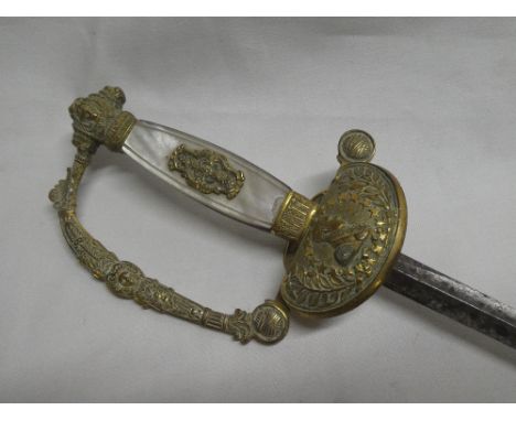 A late 19th/early 20th century French Diplomat's/court sword with shortened 18" triangular blade, gilt guard with male portra