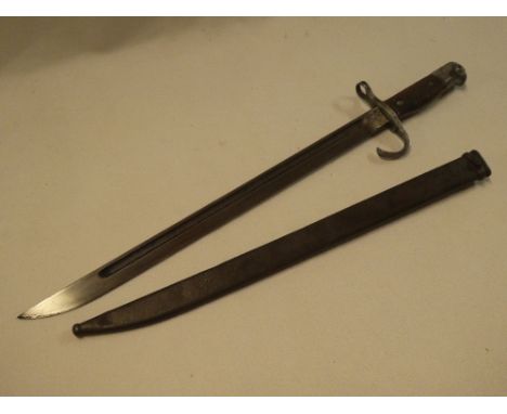 A Second War Japanese Arisaka bayonet with hooked quillon and steel scabbard