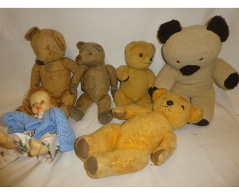 Two various vintage straw filled teddy bears, a Dean's teddy bear, two other bears and a composition doll (6)