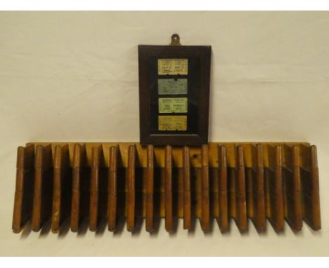 A Great Western Railway wooden Edmondson wall mounted ticket rack and a GWR rectangular frame containing four Great Western R