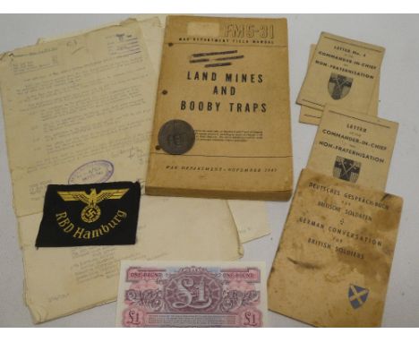 A selection of various Second War paperwork and badges including original German unissued "RBD Hamburg" badge, 1935 Nazi Part