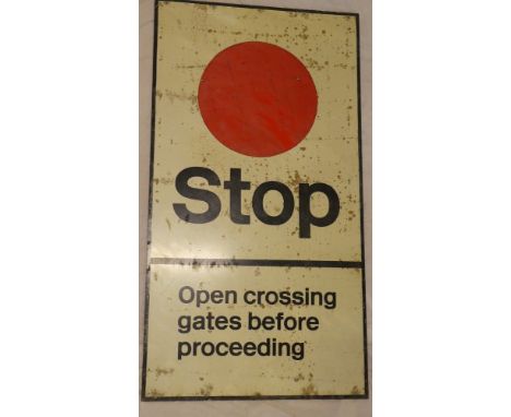 An aluminium rectangular railway sign "Stop - Open Crossing Gate Before Proceeding" 52" x 28"