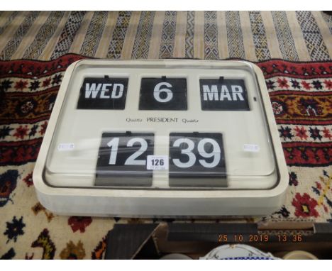 A quartz President wall clock a/f