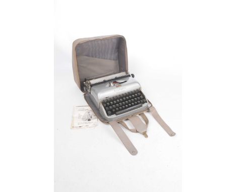 A vintage Remington travel typewriter
The mid 20th Century typewriter with all keys present, together with original case and 