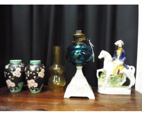 A good mixed lot to include an oil lamp, a Staffordshire flatback entitled Tom King and a pair of Royal Sidney ware vases mar