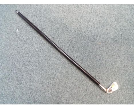 A walking stick in the form of a golf club. Estimate £20 - £30