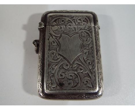 A George V hallmarked silver Vesta case, Birmingham assay 1925