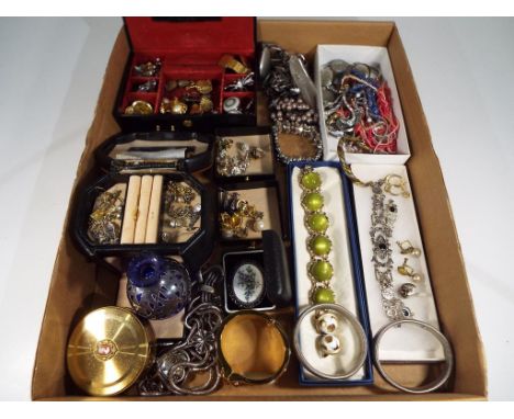 A good mixed lot of predominantly costume jewellery to include paired earrings, necklaces, bracelets, brooches, vintage powde