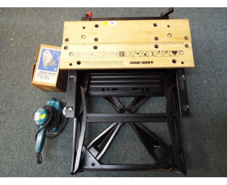 A good lot to include a Black and Decker Workmate 550 work bench, a Black and Decker power drill, circular saw attachment and