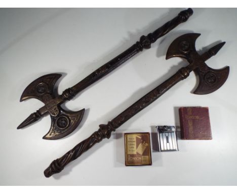 A matched pair of wall hangers in the style of axes and a Ronson cigarette lighter in original box with related ephemera