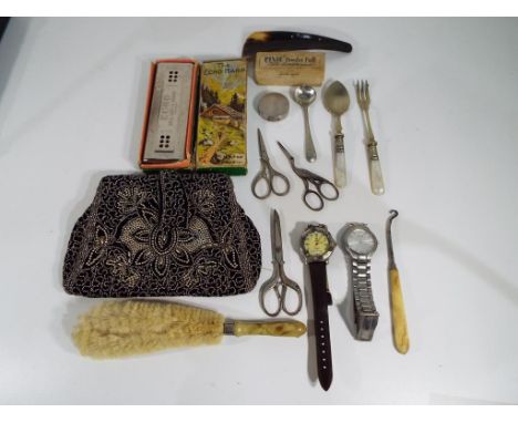 A good mixed lot to include a lady's evening purse decorated with beads, two wristwatches one by Accurist and one by Camel, t