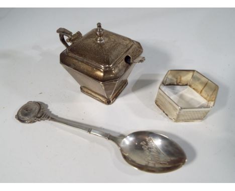 An Edward VIII hallmarked silver mustard pot, Birmingham assay 1936 with silver serving spoon, a silver napkin ring and a sil