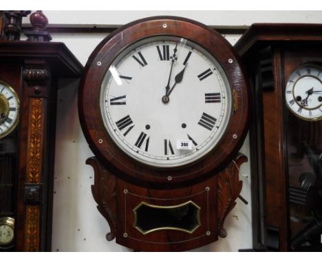 An Anglo-American wall clock with mother of pearl inlay, Roman numerals on a white dial measuring 30 cm (d) striking on the h