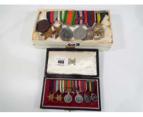 A World War Two (WW2) medal group comprising the War medal, 1939-1945 Star, Italy Star, Defence medal, Territorial Army with 