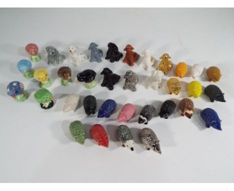 Wade - A quantity of approximately 35 Wade Whimsies, all animals, to include some metallic gold and silver coloured ones.