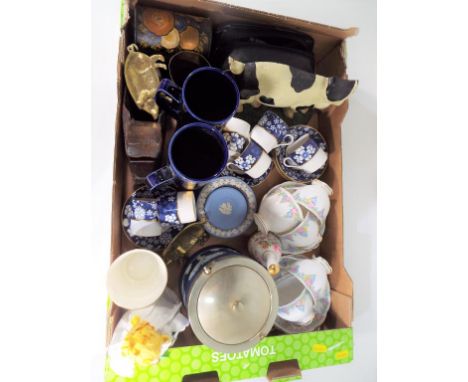 A good mixed lot to include a cast iron door stop, ceramic tableware to include Spode, Royal Albert, Wedgwood Jasperware, Hor