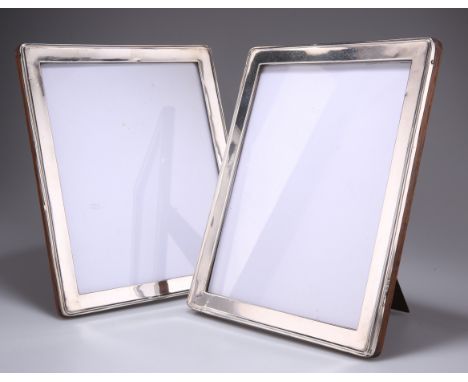 A PAIR OF GEORGE V SILVER PICTURE FRAMES,&nbsp;by&nbsp;Arthur &amp; John Zimmerman, Birmingham 1921 and 1929, rectangular wit