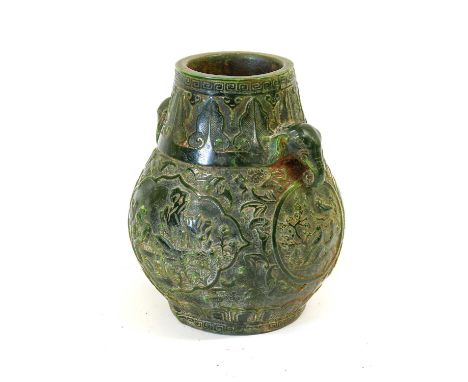 A Chinese Jade-Type Vase, in Archaic style, of baluster form with elephant mask handles, carved with figures and foliage in p