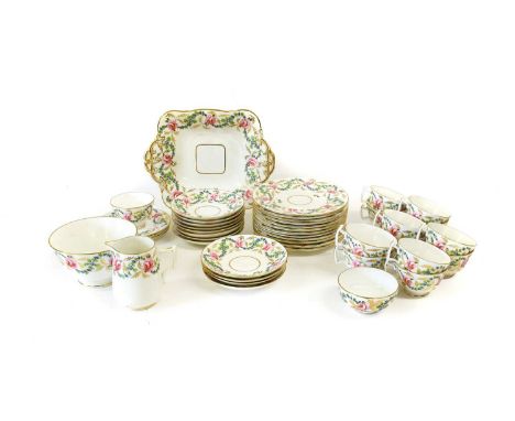 A King Street Derby Porcelain Tea Service, late 19th century, with gilt borders and painted with pink roses and cornflowers, 