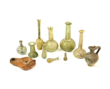 A Collection of Nine Various Roman Glass Unguentariums, probably 1st/2nd century ADthe largest 16cm highA Similar Terracotta 