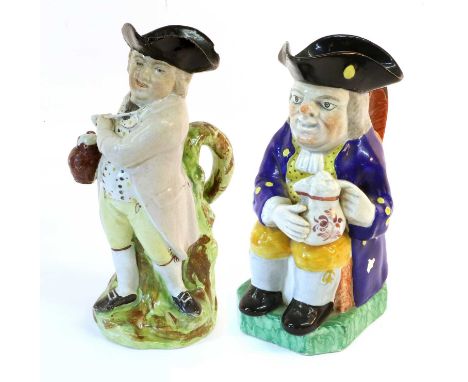 A Pearlware Hearty Goodfellow Toby Jug, 19th century, holding a jug and pipe, on a mound base coloured in enamels26cmA Simila