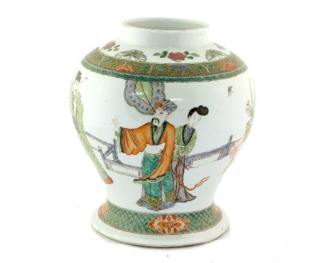 A Chinese Porcelain Baluster Jar, Kangxi reign mark but 19th century, painted in famille verte enamels with figures in a gard