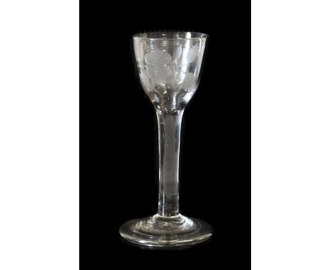 A Wine Glass of Jacobite Significance, circa 1750, the ovoid bowl engraved with a rose spray, the reverse with a bird, on a p