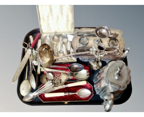 A group of plated wares, set of teaspoons in box, large ladle, desk standish, cutlery, teapot with greyhound finial etc 