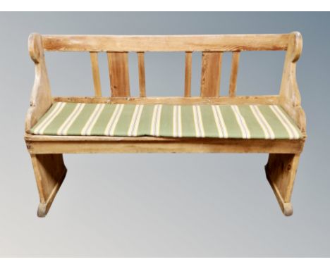 An early 20th century  pine bench, width 138 cm 