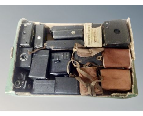 A collection of vintage cameras, T H Doublet of London bellows camera, Six-20 Brownie Junior, Brownie Model I etc 