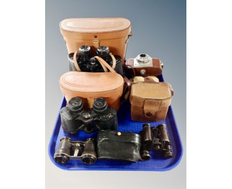 A pair of Trentor 16 x 50 binoculars, further pair of Regent 8 x 30 binoculars, pair of A R Baines of Harrogate binoculars, o