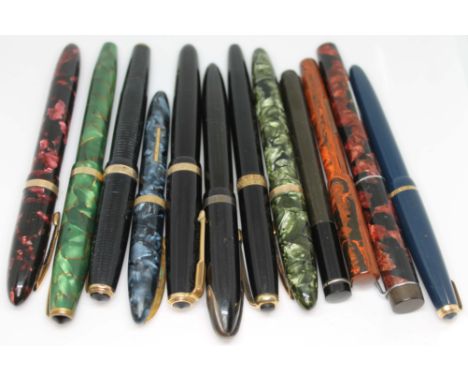 A group of 12 fountain pens including a Parker Vacumatic fountain pen with 14K gold nib, a Wyvern 202, a Sheaffer 1000, Croxl