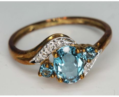 A 9ct gold cluster ring, marked '9K', gross wt. 2.6g, size W, with box.  