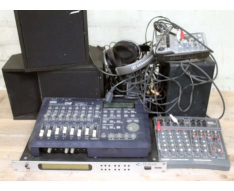A quantity of home studio equipment comprising a pair of Bose 205 speakers, a Korg TR-Rack Expanded Access Module, a Korg D8 