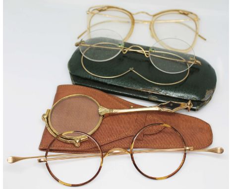 Three pairs of vintage spectacles and a gold plated lorgnette with tortoiseshell inlay.