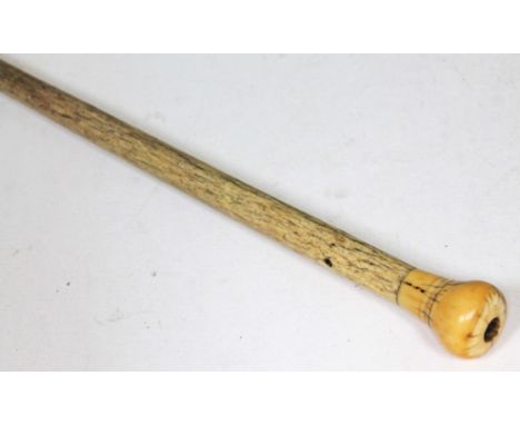 A 19th century marine ivory walking stick, length 63.5cm.  
