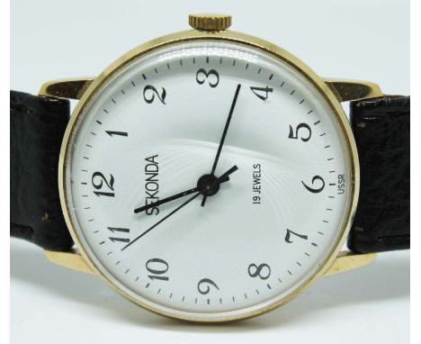 A Sekonda gold plated mechanical manual wind wristwatch with signed white dial, black  Arabic numerals and hands, 19 jewel Ra